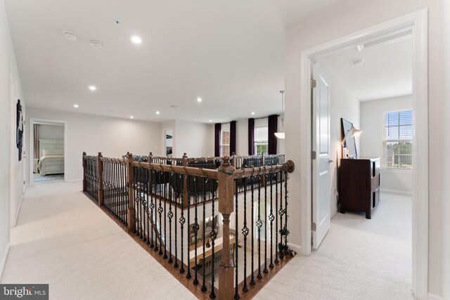 12804 Monterey Ct, Fredericksburg, VA 22407 - hall featuring light colored carpet, an upstairs landing, baseboards, and recessed lighting