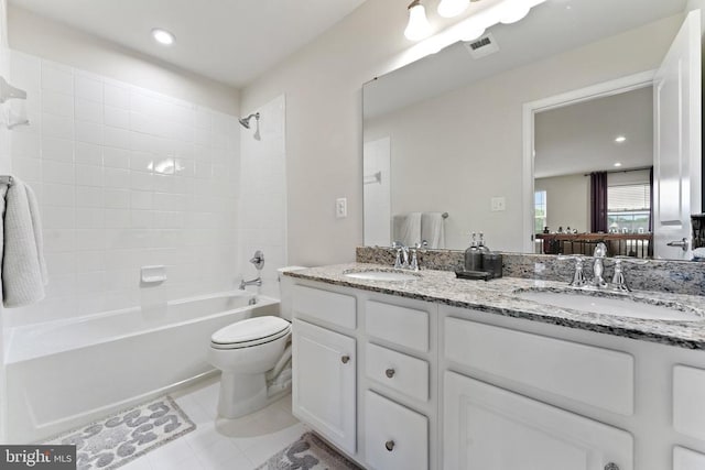 12804 Monterey Ct, Fredericksburg, VA 22407 - bathroom with double vanity, tile patterned floors, toilet, shower / bathtub combination, and recessed lighting