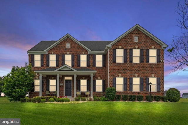 12804 Monterey Ct, Fredericksburg, VA 22407 - view of front of property with a lawn, brick siding, and covered porch