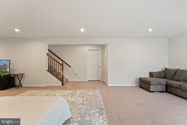 12804 Monterey Ct, Fredericksburg, VA 22407 - carpeted living area featuring stairs, recessed lighting, and baseboards