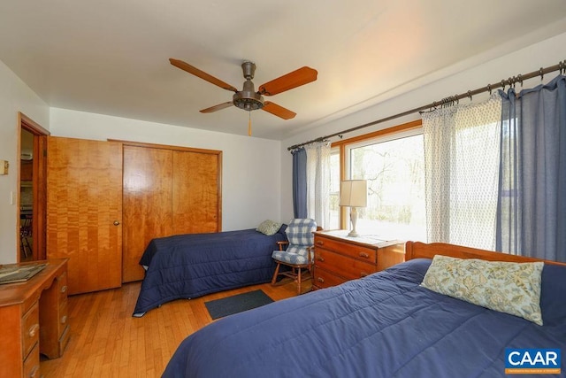 6928 Blackwells Hollow Rd, Crozet, VA 22932 - bedroom with light wood-style floors, a closet, and a ceiling fan