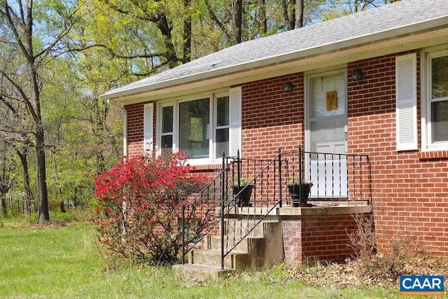 6928 Blackwells Hollow Rd, Crozet, VA 22932 - view of front facade featuring brick siding and roof with shingles