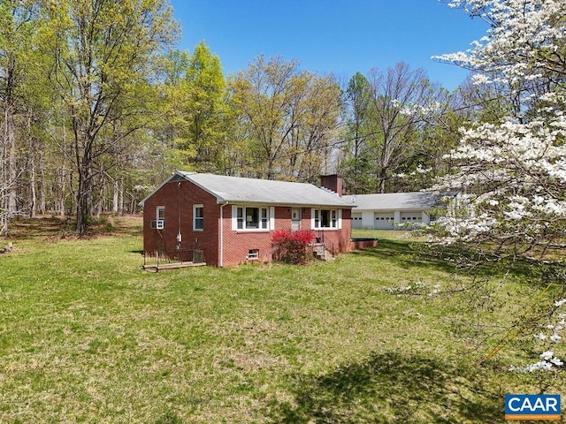 6928 Blackwells Hollow Rd, Crozet, VA 22932 - rear view of property with brick siding, a lawn, and a chimney