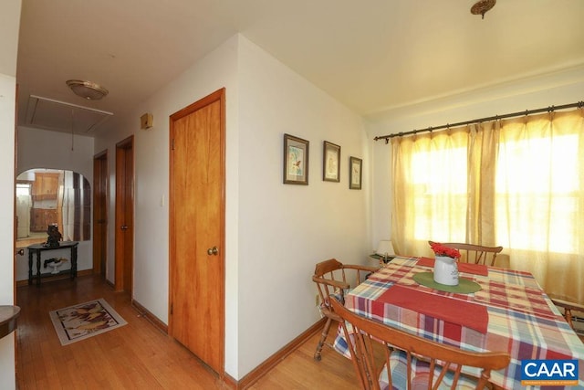 6928 Blackwells Hollow Rd, Crozet, VA 22932 - dining space with attic access, light wood-style flooring, and baseboards