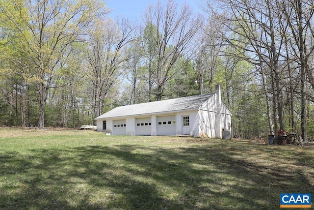 6928 Blackwells Hollow Rd, Crozet, VA 22932 - detached garage featuring a view of trees