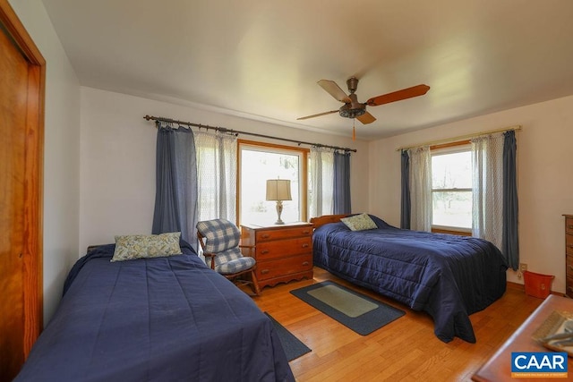 6928 Blackwells Hollow Rd, Crozet, VA 22932 - bedroom with wood finished floors and ceiling fan