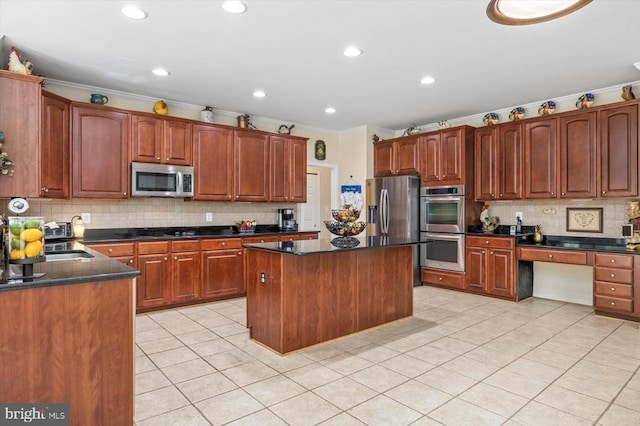 11110 Park Ridge Rd, Fredericksburg, VA 22408 - kitchen featuring light tile patterned floors, crown molding, a kitchen island, stainless steel appliances, and tasteful backsplash