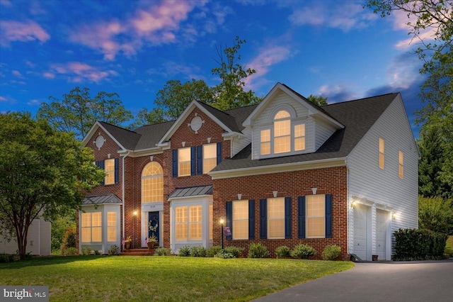 11110 Park Ridge Rd, Fredericksburg, VA 22408 - view of front of property with a lawn, driveway, brick siding, and a garage