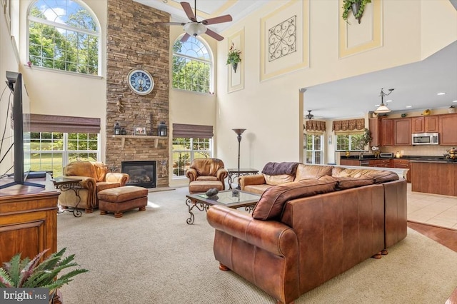 11110 Park Ridge Rd, Fredericksburg, VA 22408 - living room with a high ceiling, a ceiling fan, and plenty of natural light