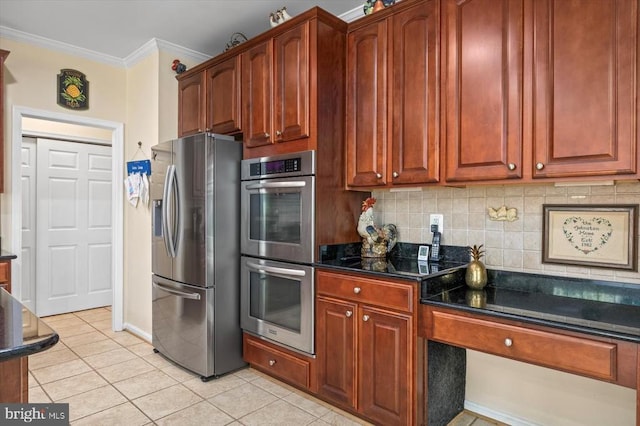 11110 Park Ridge Rd, Fredericksburg, VA 22408 - kitchen featuring stainless steel appliances, dark stone countertops, ornamental molding, light tile patterned flooring, and backsplash