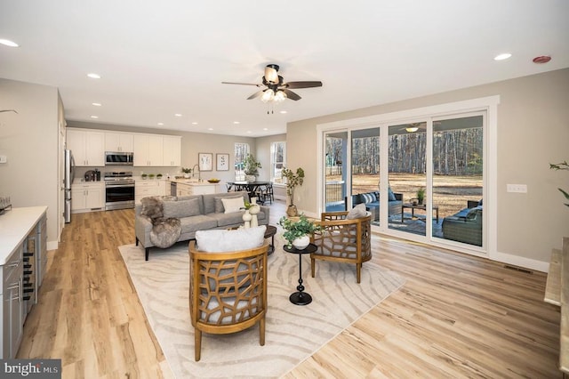 92 Mill Run, Bumpass, VA 23024 - living area featuring a ceiling fan, light wood-type flooring, visible vents, baseboards, and recessed lighting