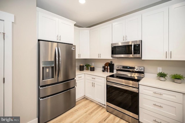 92 Mill Run, Bumpass, VA 23024 - kitchen with white cabinetry, light countertops, and appliances with stainless steel finishes