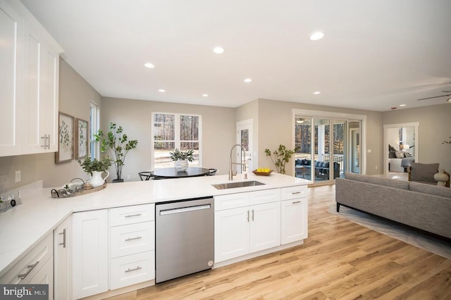 92 Mill Run, Bumpass, VA 23024 - kitchen with a peninsula, a sink, open floor plan, white cabinetry, and dishwasher
