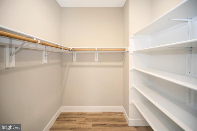 92 Mill Run, Bumpass, VA 23024 - spacious closet featuring wood finished floors