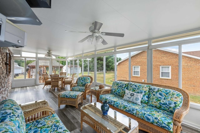 sunroom featuring ceiling fan, an outdoor hangout area, outdoor dining space, and plenty of natural light