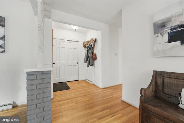  - foyer featuring light wood-style floors and baseboards