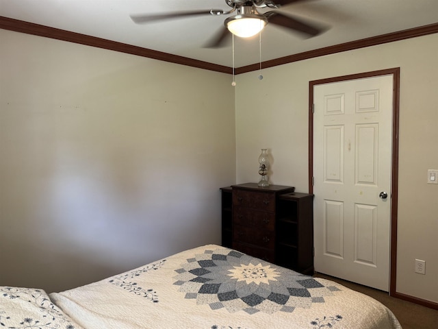 bedroom with carpet flooring, ornamental molding, ceiling fan, and baseboards