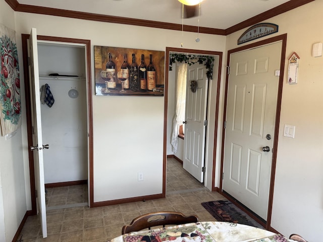 unfurnished bedroom featuring ornamental molding and baseboards
