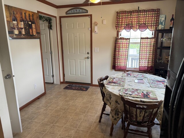 dining room featuring baseboards