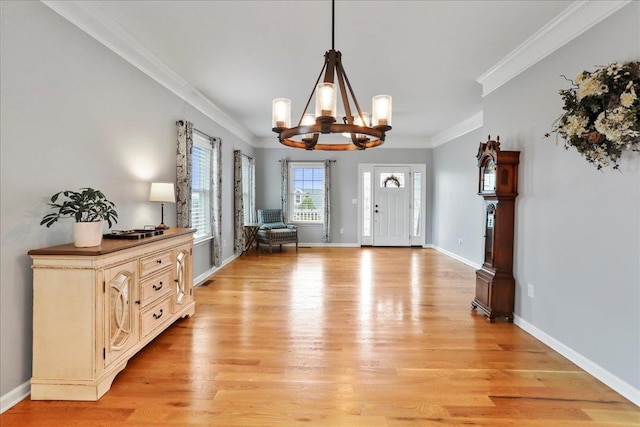 115 Beauregard Dr, Staunton, VA 24401 - foyer entrance featuring a chandelier, light wood finished floors, crown molding, and baseboards