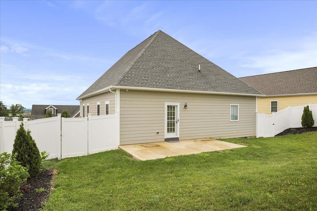 115 Beauregard Dr, Staunton, VA 24401 - back of property with a shingled roof and a patio area