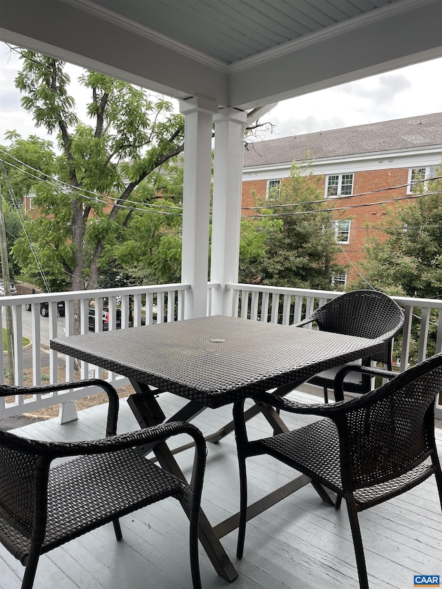 balcony featuring outdoor dining space
