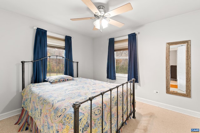 5998 Faber Rd, Faber, VA 22938 - bedroom featuring light carpet, baseboards, and a ceiling fan