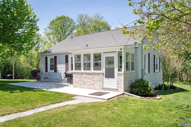 5998 Faber Rd, Faber, VA 22938 - view of front of home featuring a front lawn, roof with shingles, stone siding, and a patio area