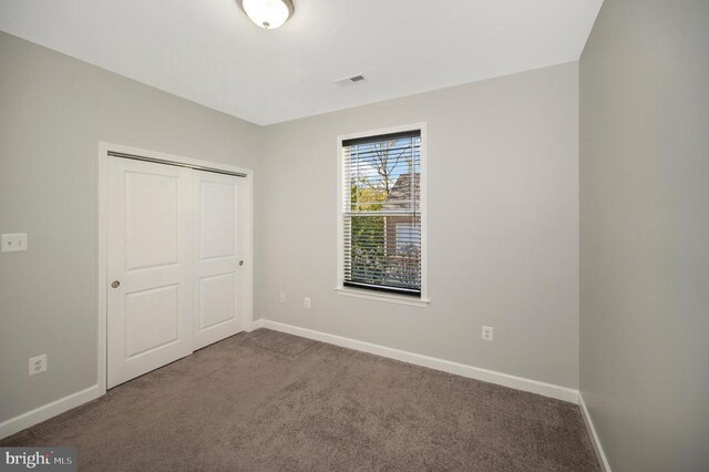 106 Wakefield Dr, Locust Grove, VA 22508 - unfurnished bedroom with carpet, baseboards, and a closet
