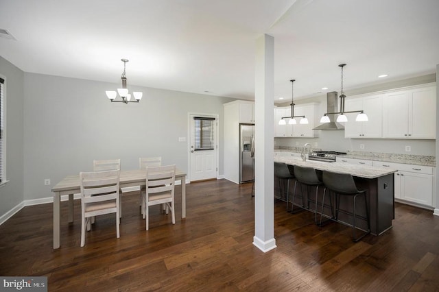 106 Wakefield Dr, Locust Grove, VA 22508 - dining area with a chandelier, dark wood finished floors, recessed lighting, and baseboards