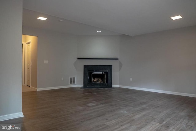 10732 Wakeman Dr, Fredericksburg, VA 22407 - unfurnished living room with wood finished floors, a fireplace with flush hearth, and recessed lighting