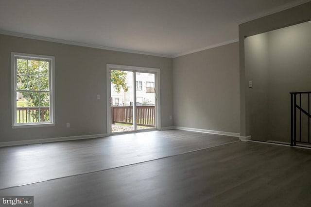 10732 Wakeman Dr, Fredericksburg, VA 22407 - spare room featuring dark wood-type flooring, ornamental molding, and plenty of natural light