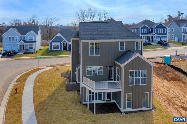 240 Thicket Run Dr, Charlottesville, VA 22911 - exterior space with a lawn, board and batten siding, a residential view, and a shingled roof