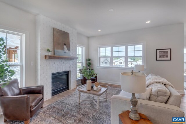 240 Thicket Run Dr, Charlottesville, VA 22911 - living area with recessed lighting, a brick fireplace, baseboards, and wood finished floors