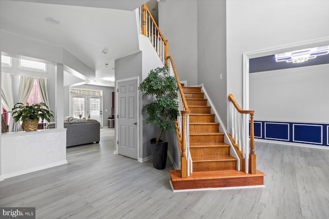 7922 Madison Plantation Way, Fredericksburg, VA 22407 - staircase with wood finished floors and a towering ceiling
