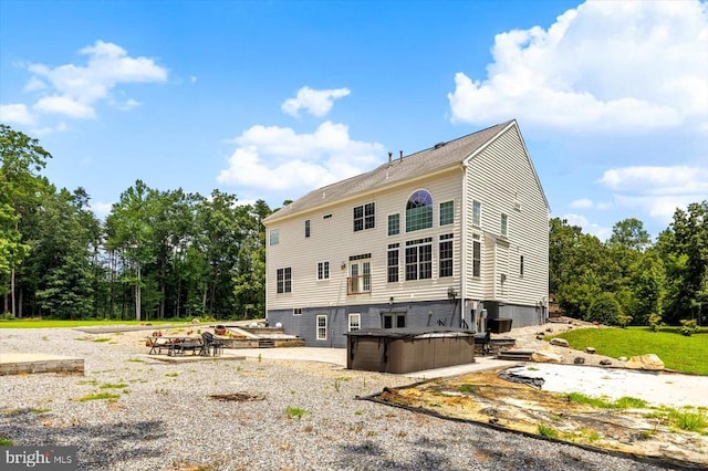 7922 Madison Plantation Way, Fredericksburg, VA 22407 - rear view of house with a hot tub