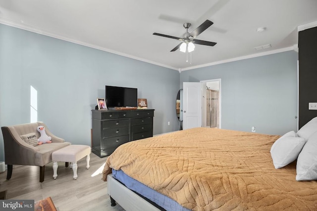1906 Captain Dr, Fredericksburg, VA 22408 - bedroom with wood finished floors, crown molding, and ceiling fan