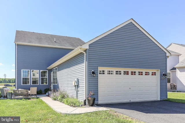 1906 Captain Dr, Fredericksburg, VA 22408 - view of front of house with a garage and asphalt driveway