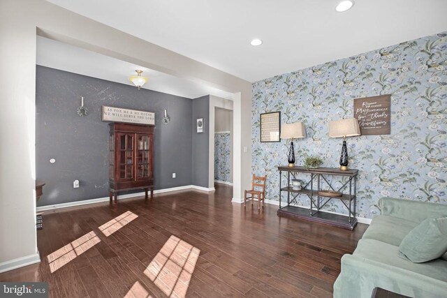 1906 Captain Dr, Fredericksburg, VA 22408 - living area featuring wallpapered walls, wood finished floors, baseboards, recessed lighting, and an accent wall