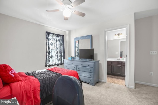 1906 Captain Dr, Fredericksburg, VA 22408 - bedroom with light carpet, a sink, ensuite bathroom, baseboards, and ceiling fan