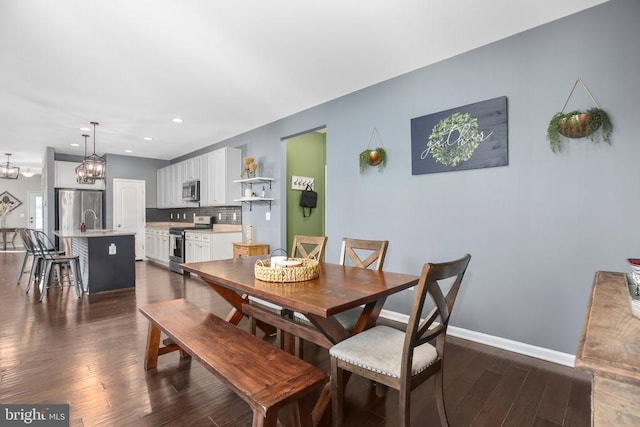 1906 Captain Dr, Fredericksburg, VA 22408 - dining space with dark wood-style floors, baseboards, recessed lighting, and a chandelier