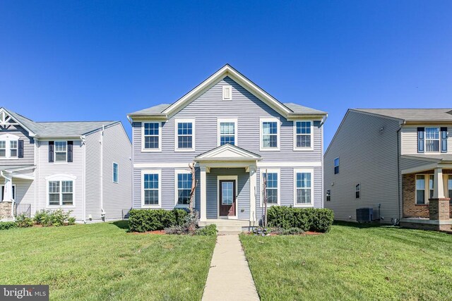 1906 Captain Dr, Fredericksburg, VA 22408 - view of front of property featuring a front lawn and central AC unit