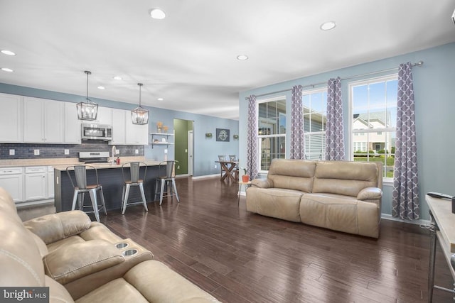 1906 Captain Dr, Fredericksburg, VA 22408 - living area with baseboards, recessed lighting, and dark wood-style floors