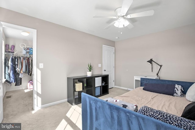 1906 Captain Dr, Fredericksburg, VA 22408 - bedroom featuring carpet flooring, a walk in closet, and baseboards
