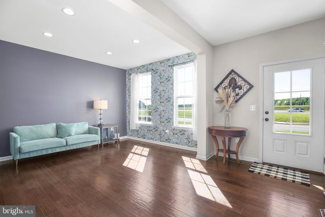 1906 Captain Dr, Fredericksburg, VA 22408 - sitting room featuring baseboards, wood finished floors, wallpapered walls, an accent wall, and recessed lighting