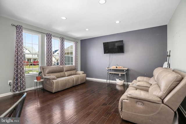 1906 Captain Dr, Fredericksburg, VA 22408 - living area with baseboards, wood finished floors, recessed lighting, and an accent wall