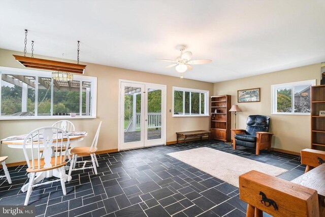 403 Long Ave, Shenandoah, VA 22849 - living room featuring a ceiling fan, healthy amount of natural light, and baseboards