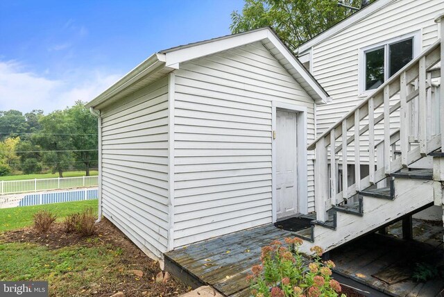 403 Long Ave, Shenandoah, VA 22849 - view of home's exterior featuring stairway, fence, and an outdoor structure