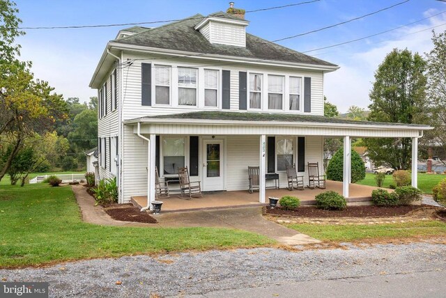 403 Long Ave, Shenandoah, VA 22849 - view of front of home with a front lawn, a porch, roof with shingles, and a chimney