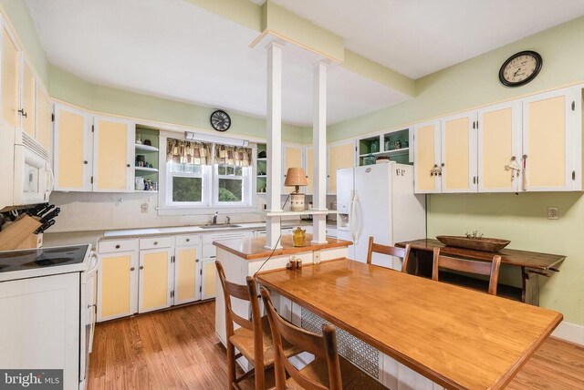 403 Long Ave, Shenandoah, VA 22849 - kitchen with a sink, light wood-type flooring, white appliances, and open shelves